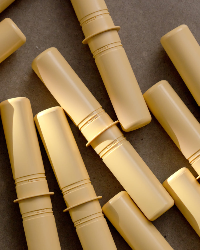 Honey yellow MODU pegs on stone floor