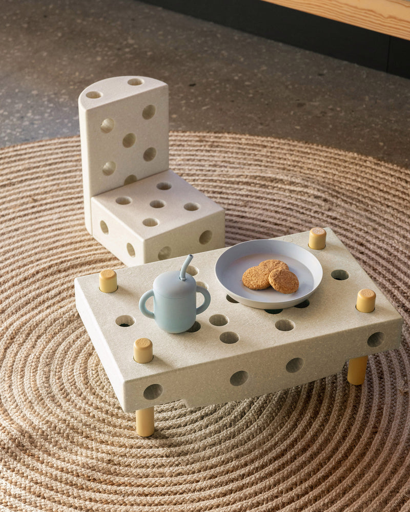 MODU kids table and chair set, styled in living room. Built from Explorer Set in Sand Grey Honey Yellow.
