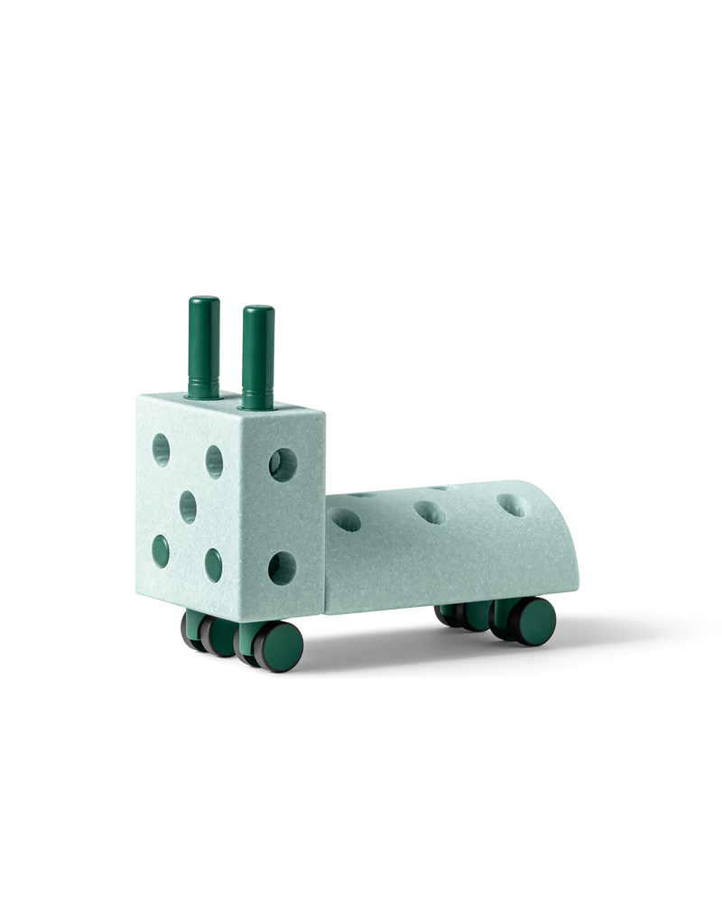 MODU Tiny Ride, ride-on toy for babies and toddlers, in the color Ocean Mint Forest Green.