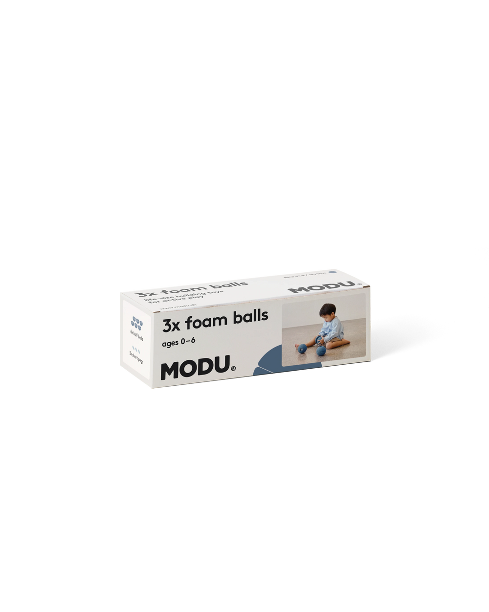Æske med MODU skumbolde på en hvid baggrund