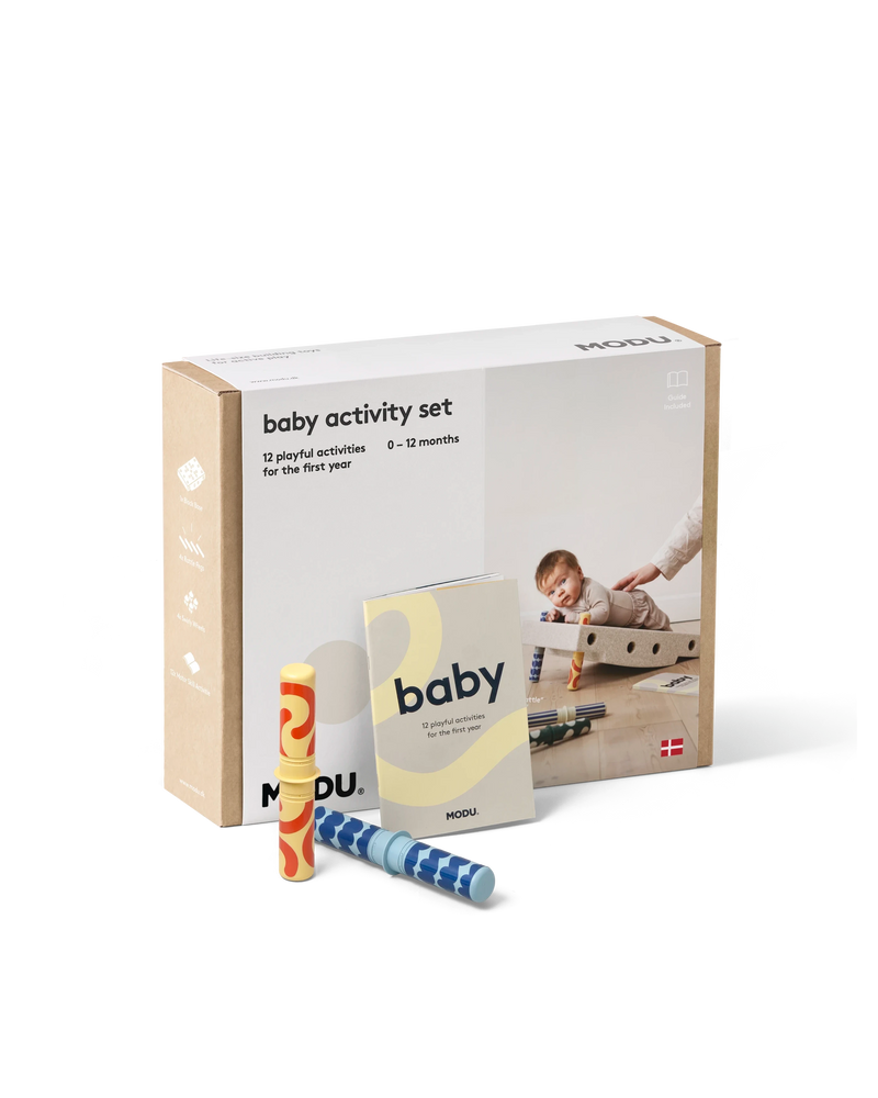 Front of the sand grey MODU Baby Activity Set packaging.