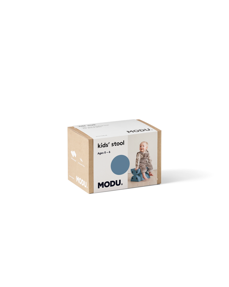 Product packaging for the deep blue MODU Kids' Stool, an open-ended building toy designed for active play.