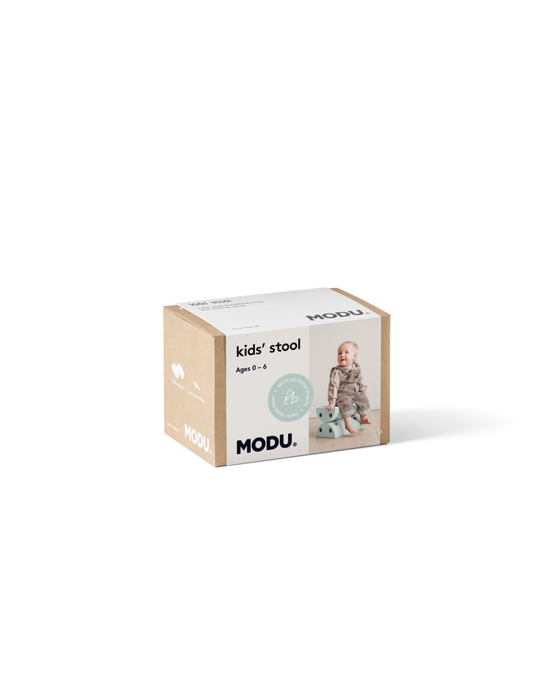 Product packaging for the ocean mint MODU Kids' Stool, a modular building toy for active play.