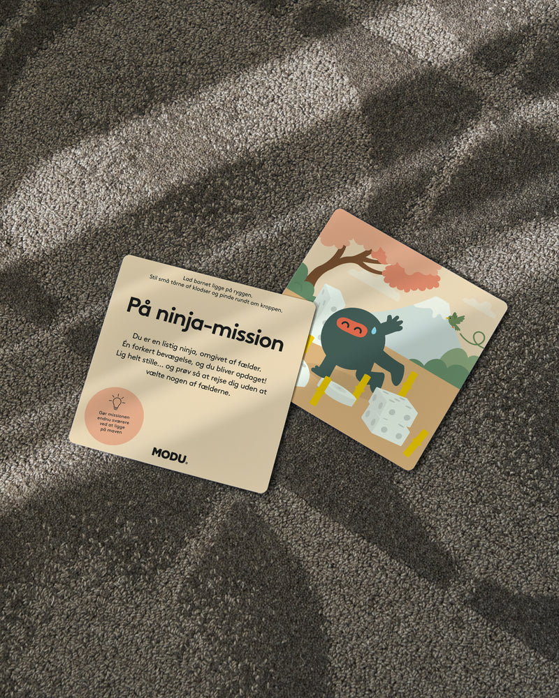 A close-up view of a “Ninja Mission” card from the MODU Play Cards set, showing an active play activity for children.