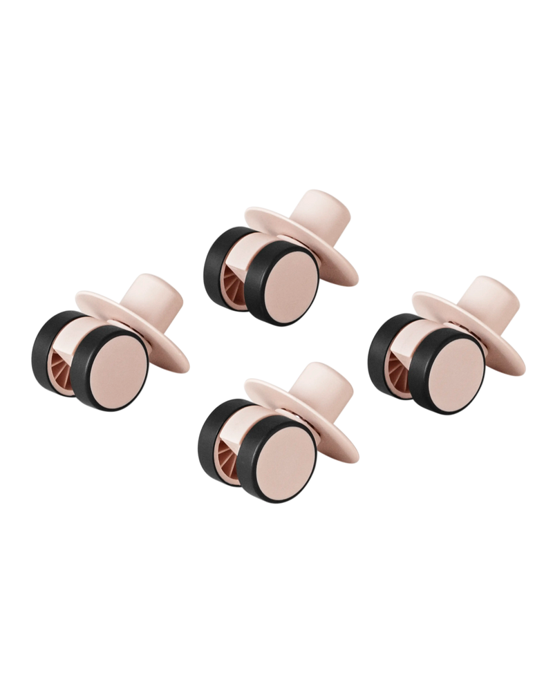 MODU swirly wheels in Soft Rose. For indoor scooters and ride-ons. 360 degree rotation. Floor-protecting rubber.