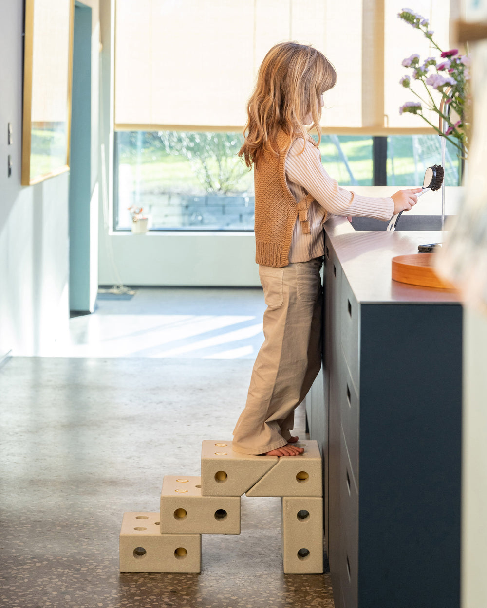 Kids step stool. Built from MODU square blocks. Life-sized building toy.