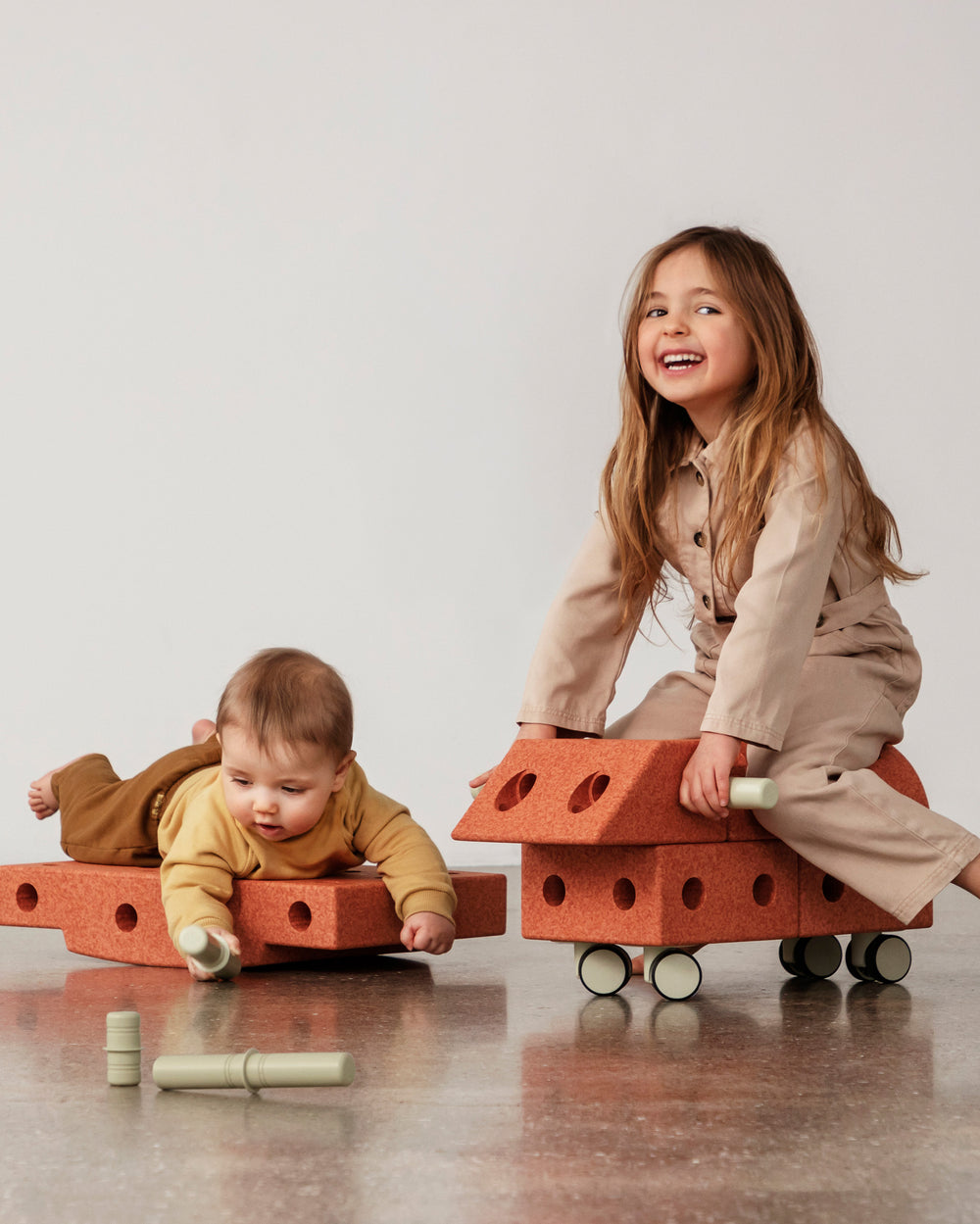 MODU Explorer Set Burnt Orange Dusty Green. Life-sized building toy. Encourages creativity, active play, and motor skill development.