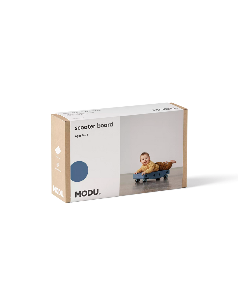 Product packaging for the deep blue MODU Scooter Board, an activity toy built for active play and motor skills.