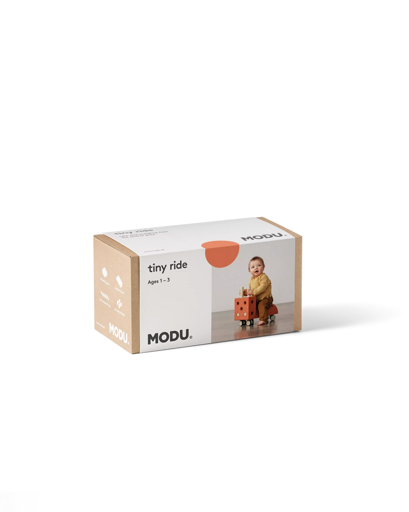 MODU Tiny Ride in Burnt Orange Dusty Green packaging.