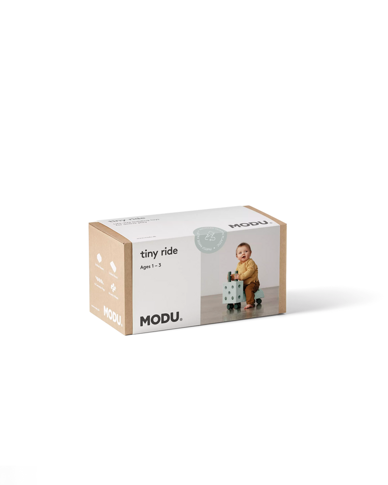 MODU Tiny Ride in Ocean Mint Forest Green packaging.